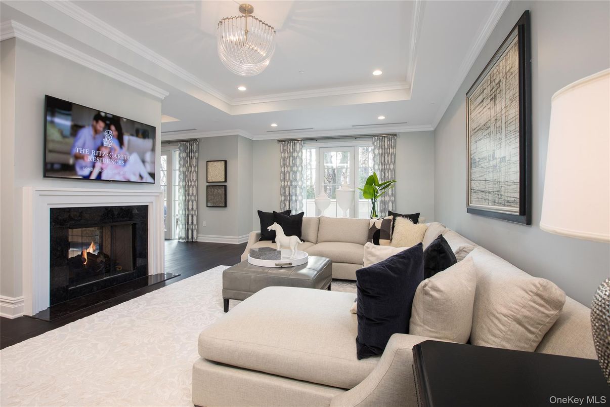 Chandelier, Fireplace, Interior, Living room, Recessed Lighting, Wood Texture Flooring