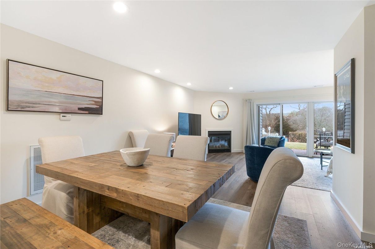 Dining room, Fireplace, Interior, Living room, Recessed Lighting, Wood Texture Flooring