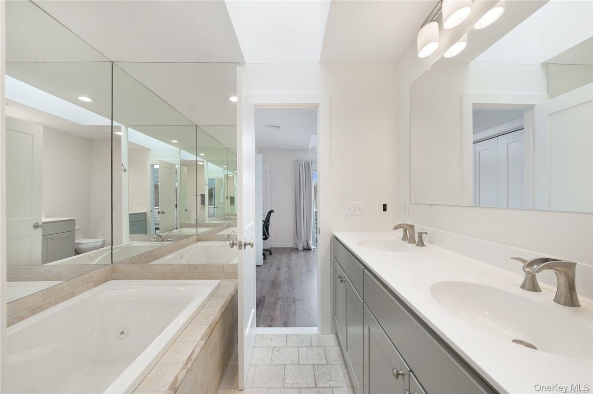 Bathroom, Dual Sink Vanities, Interior, Recessed Lighting, Wood Texture Flooring