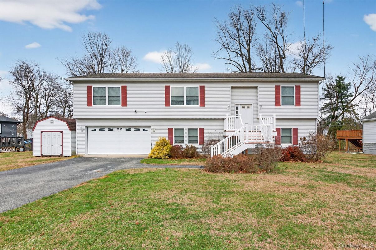 Attached, Exterior, Facade, Raised Ranch