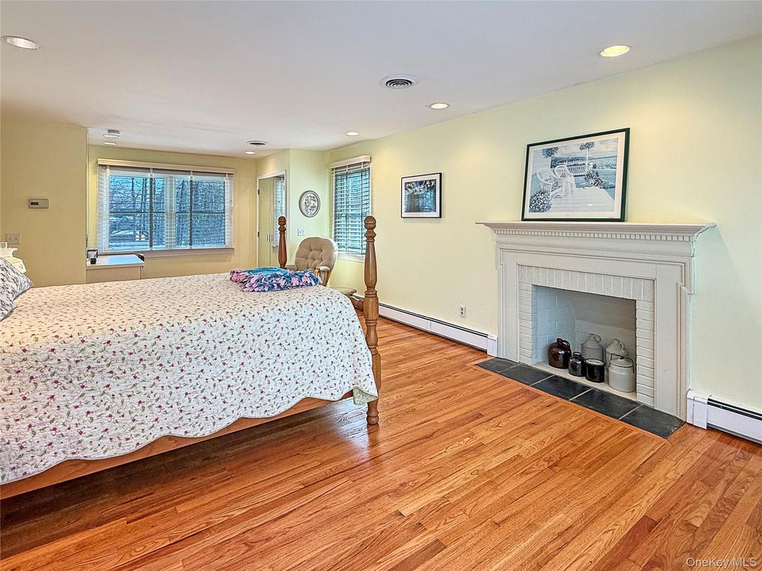 Bedroom, Fireplace, Interior, Recessed Lighting, Wood Texture Flooring