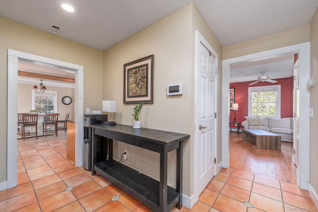 Dining room, Fireplace, Interior, Living room, Recessed Lighting, Wood Texture Flooring