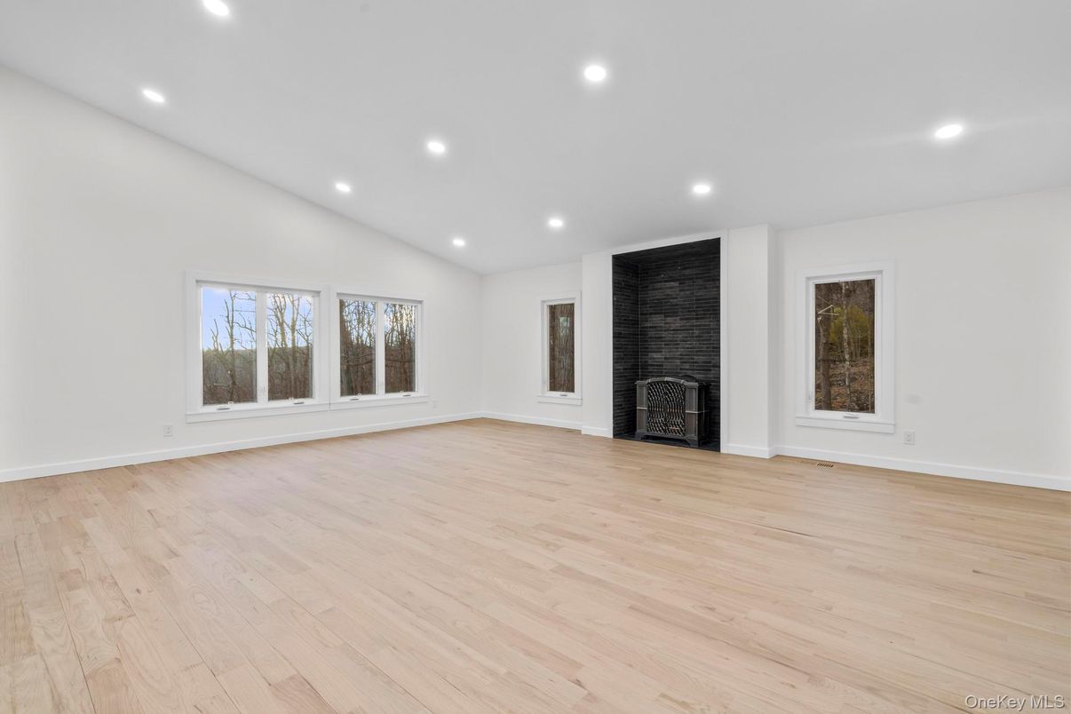 Empty room, Fireplace, Interior, Recessed Lighting, Wood Texture Flooring