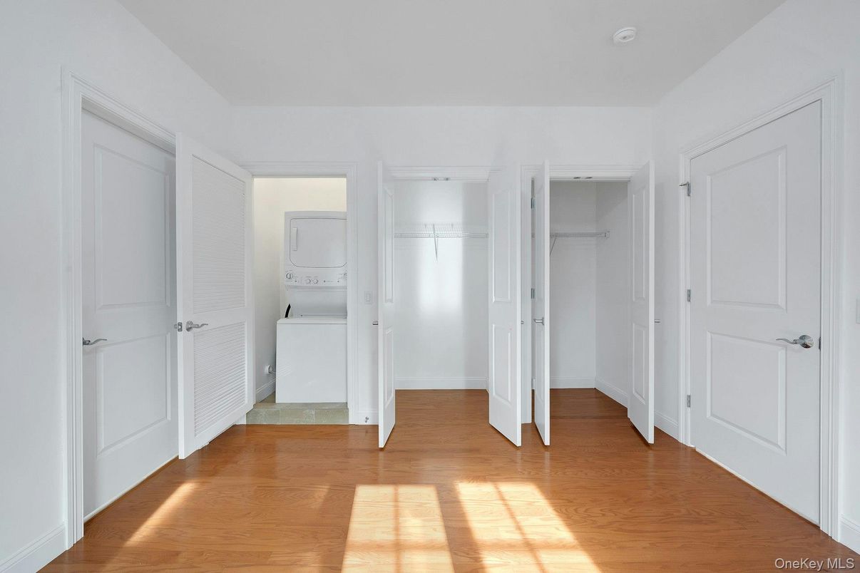 Empty room, Interior, Utility Closets, Washer, Wood Texture Flooring