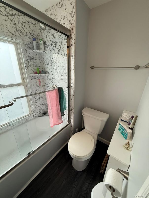 Bathroom, Glass Shower, Interior, Marble Walls, Wood Texture Flooring