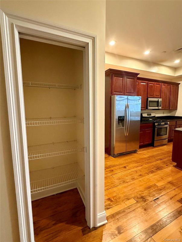 Interior, Kitchen, Recessed Lighting, Stainless Steel Appliances, Wood Texture Flooring