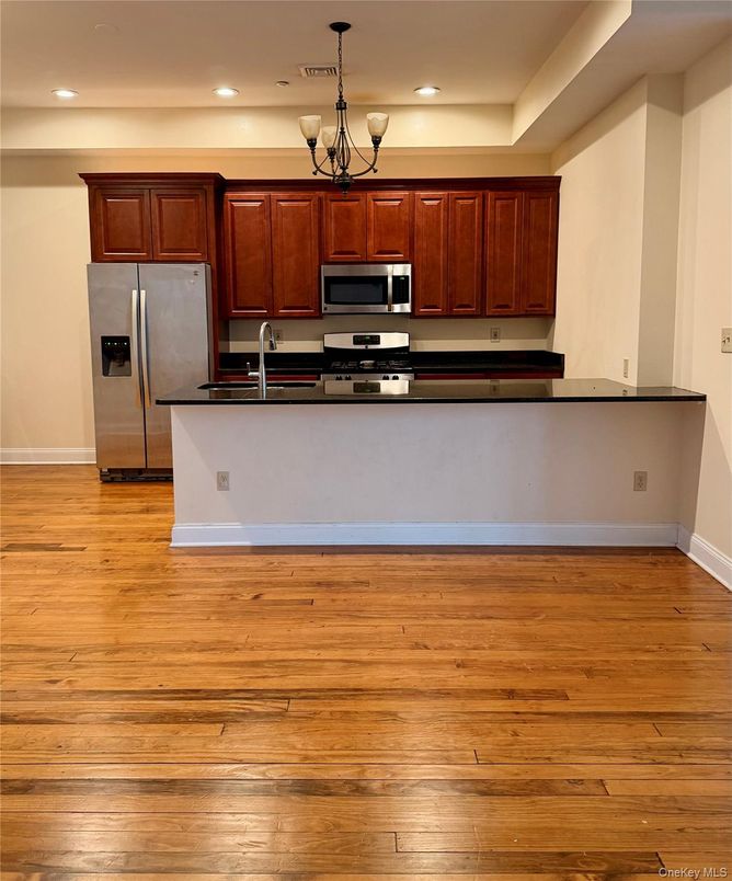 Chandelier, Interior, Kitchen, Recessed Lighting, Stainless Steel Appliances, Wood Texture Flooring