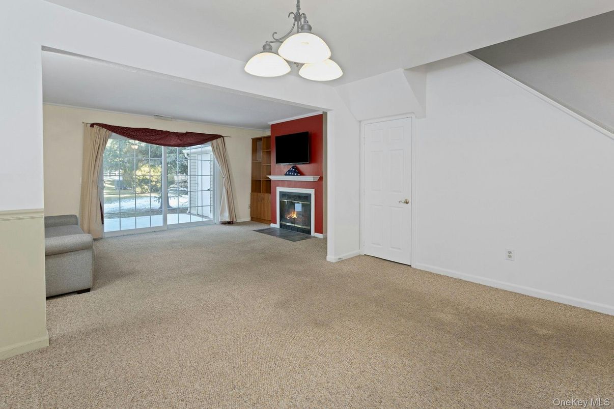 Chandelier, Empty room, Fireplace, Interior
