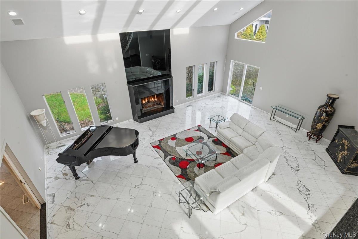 Fireplace, Interior, Living room, Marble, Piano, Recessed Lighting