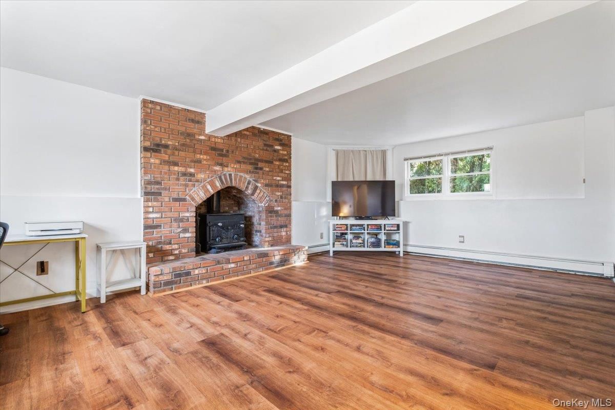 Empty room, Fireplace, Interior, Stone Walls, Wood Texture Flooring