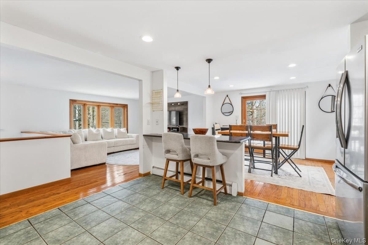 Dining room, Interior, Kitchen, Living room, Pendant Lights, Recessed Lighting, Wood Texture Flooring