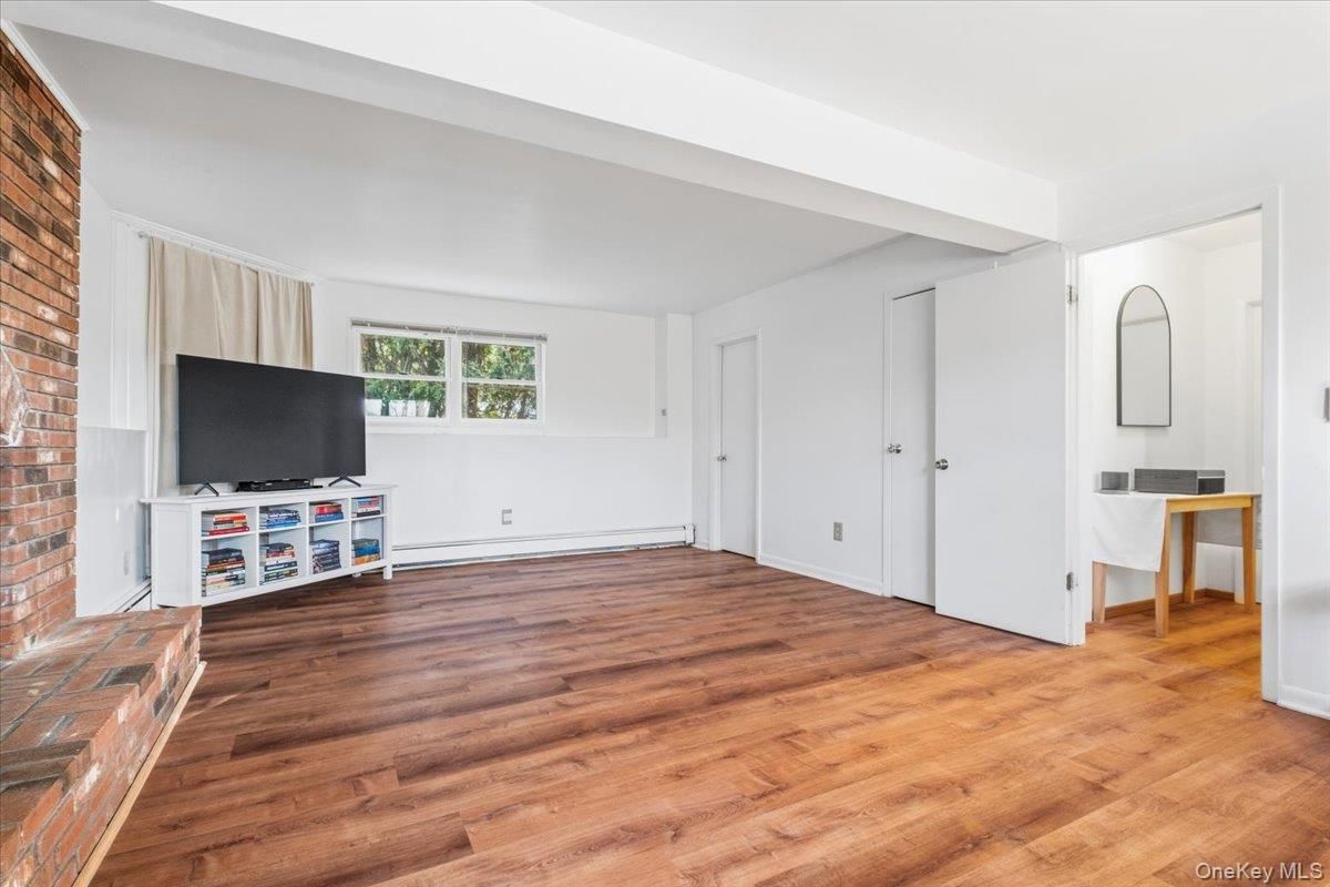 Empty room, Fireplace, Interior, Stone Walls, Wood Texture Flooring