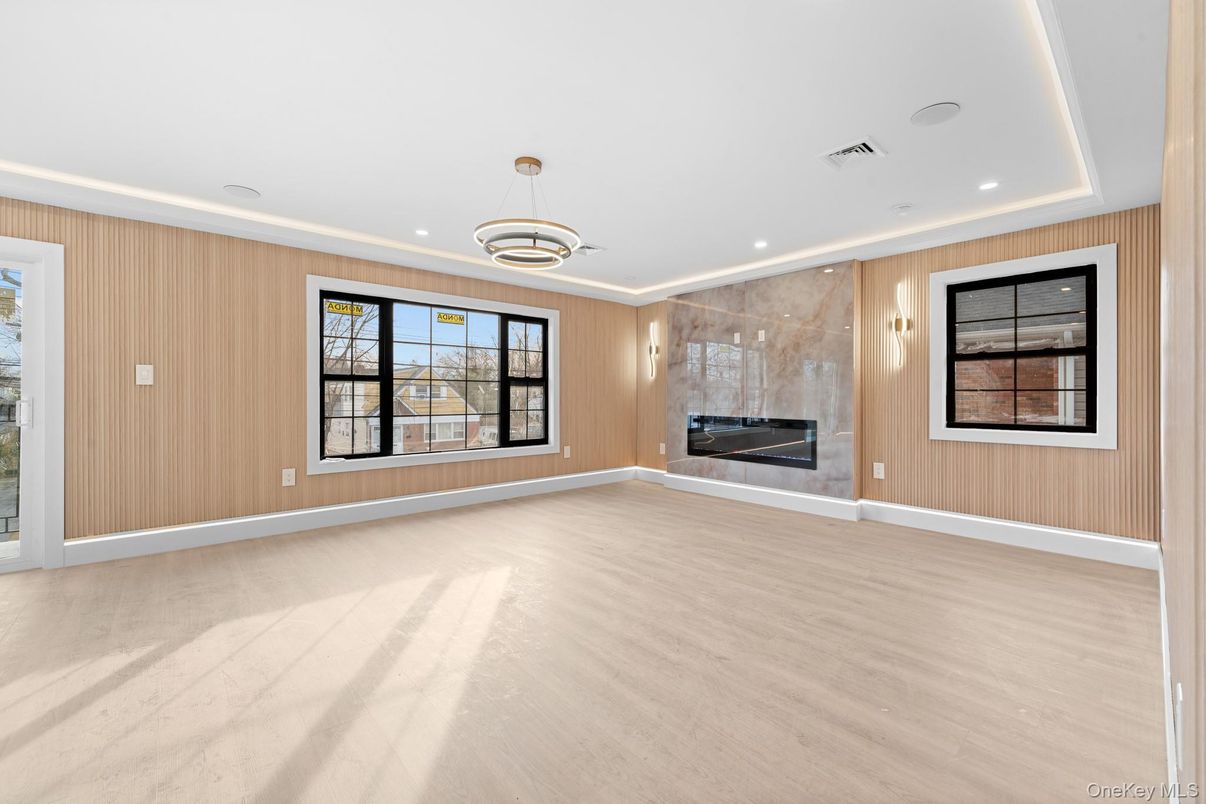 Empty room, Fireplace, Interior, Pendant Lights, Recessed Lighting, Wood Texture Flooring, Wooden Walls