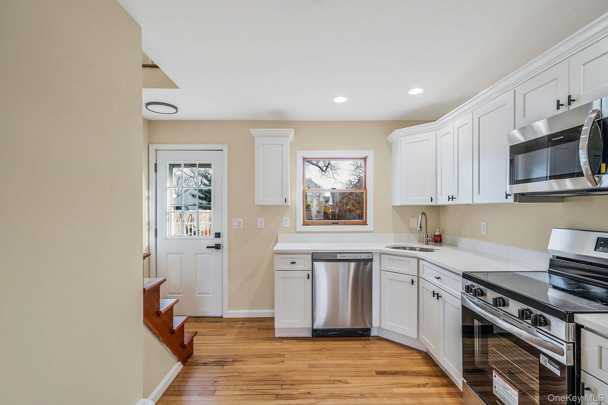 Interior, Kitchen, Recessed Lighting, Stainless Steel Appliances, Wood Texture Flooring