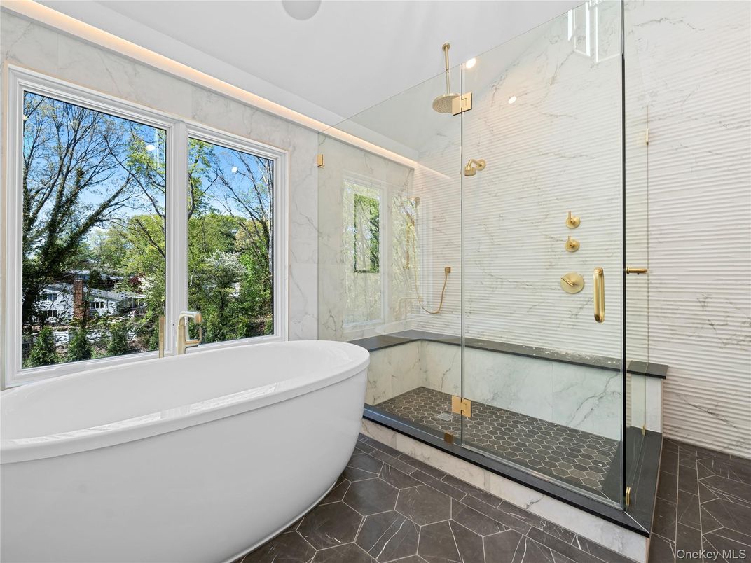 Bathroom, Free Standing Baths, Glass Shower, Interior, Marble, Marble Walls, Recessed Lighting