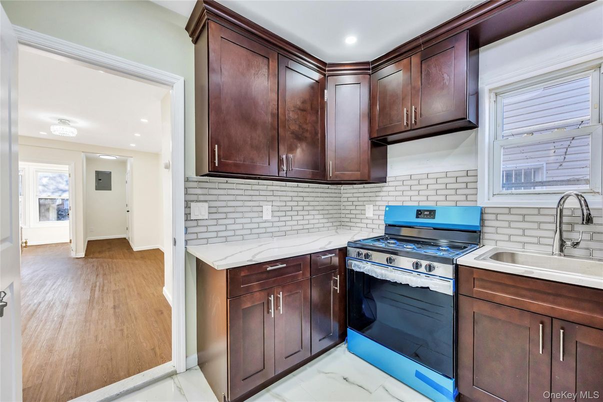 Interior, Kitchen, Marble, Recessed Lighting, Stainless Steel Appliances, Wood Texture Flooring