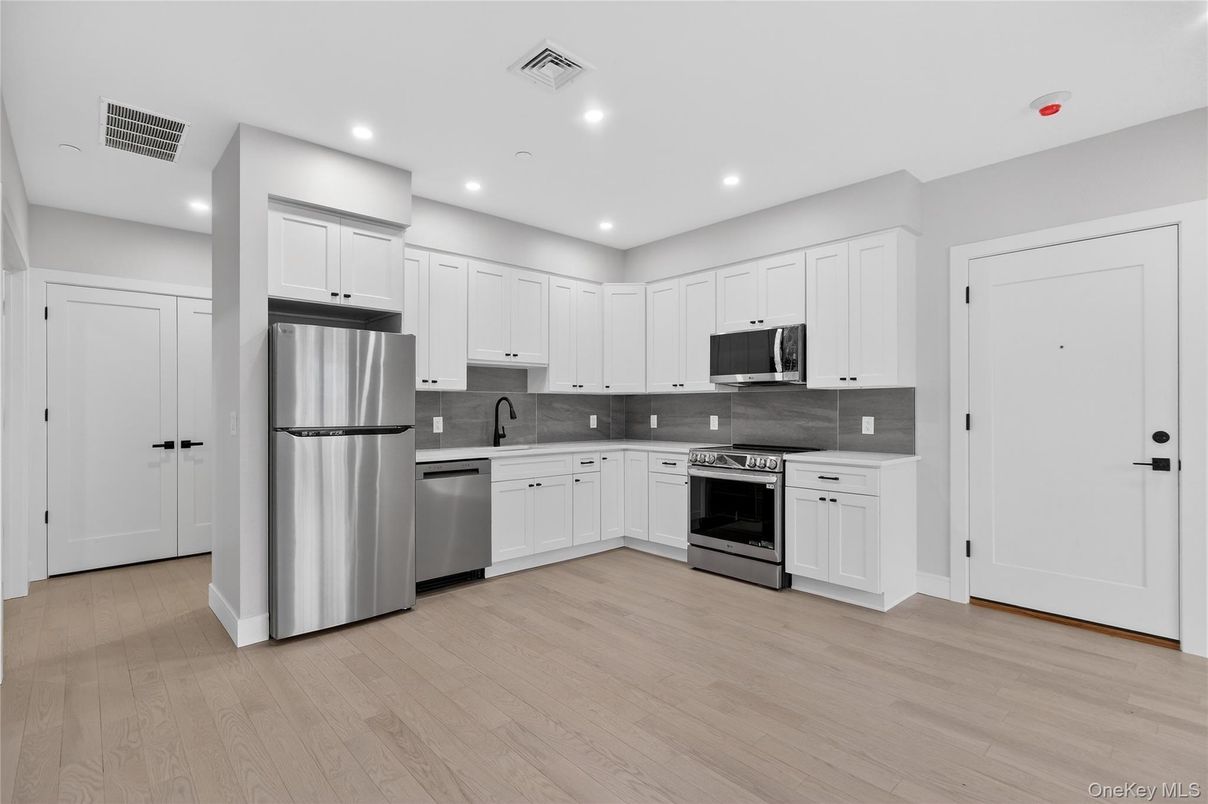 Interior, Kitchen, Recessed Lighting, Stainless Steel Appliances, Wood Texture Flooring