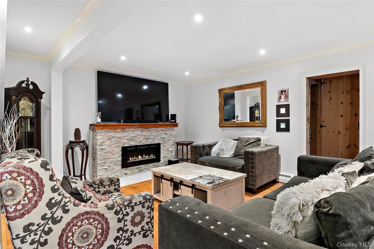 Fireplace, Interior, Living room, Recessed Lighting, Wood Texture Flooring