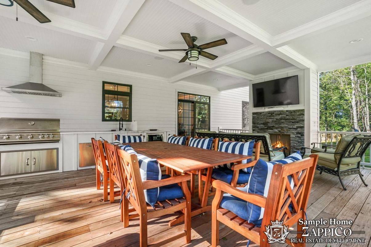 Dining room, Fireplace, Interior, Living room, Recessed Lighting, Wood Texture Flooring