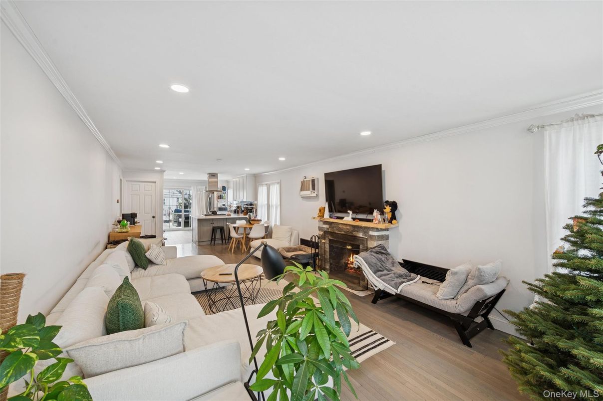 Fireplace, Interior, Kitchen, Living room, Recessed Lighting, Wood Texture Flooring