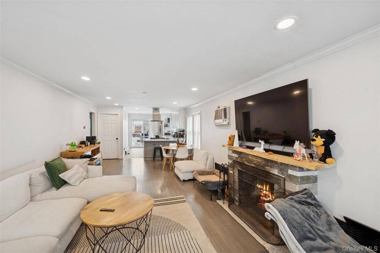 Dining room, Fireplace, Interior, Kitchen, Living room, Recessed Lighting, Wood Texture Flooring