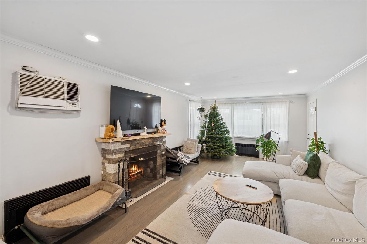 Fireplace, Interior, Living room, Recessed Lighting, Wood Texture Flooring