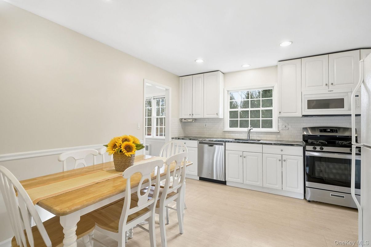 Dining room, Interior, Kitchen, Recessed Lighting, Stainless Steel Appliances, Wood Texture Flooring