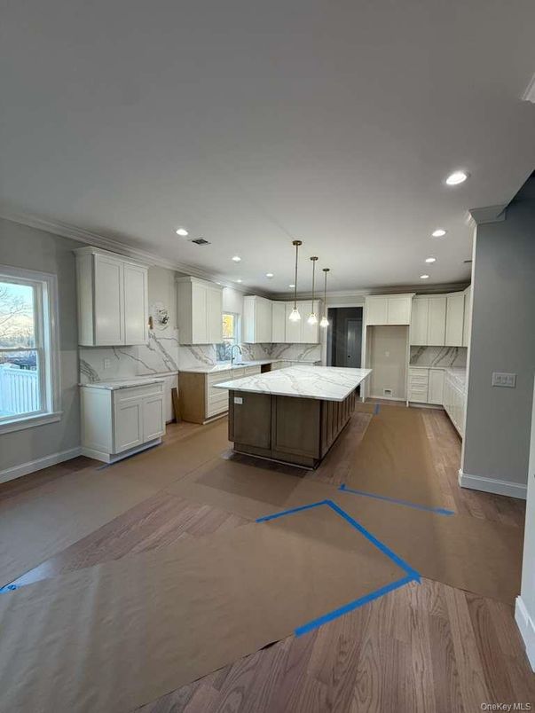Interior, Kitchen, Marble Walls, Pendant Lights, Recessed Lighting, Wood Texture Flooring