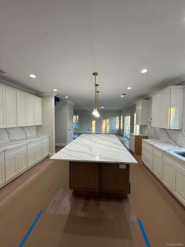 Interior, Kitchen, Marble Walls, Pendant Lights, Recessed Lighting, Wood Texture Flooring