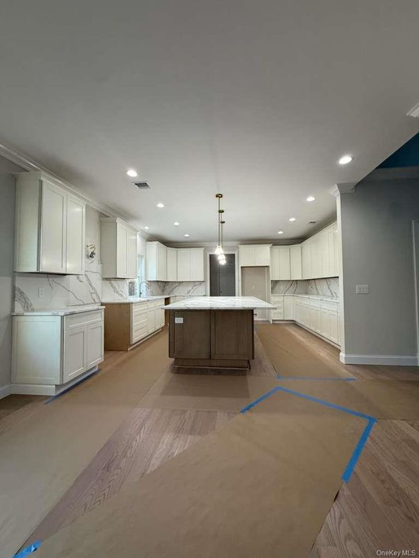 Interior, Kitchen, Marble Walls, Pendant Lights, Recessed Lighting, Wood Texture Flooring