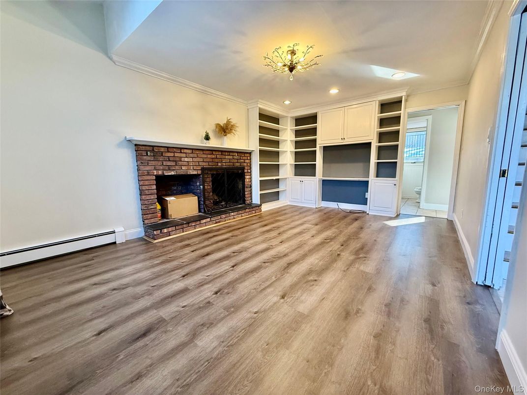 Empty room, Fireplace, Interior, Recessed Lighting, Wood Texture Flooring