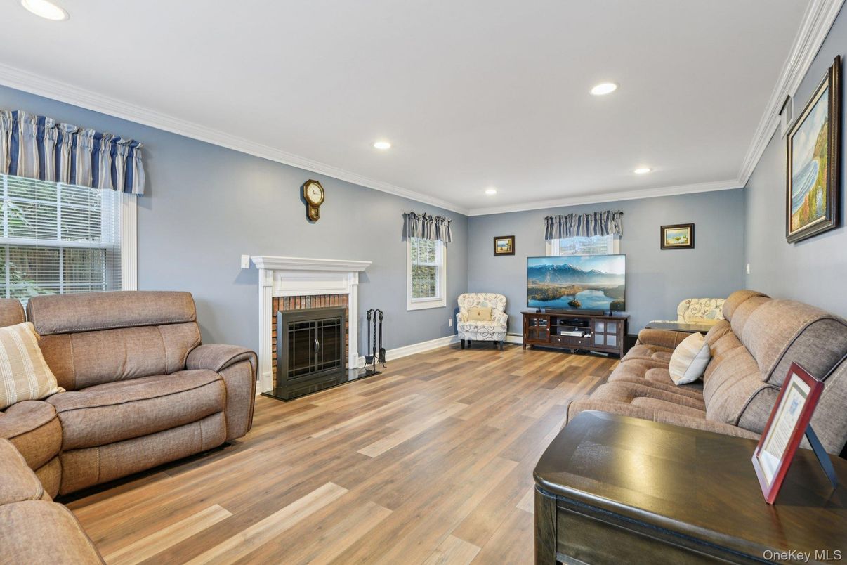 Fireplace, Interior, Living room, Recessed Lighting, Wood Texture Flooring