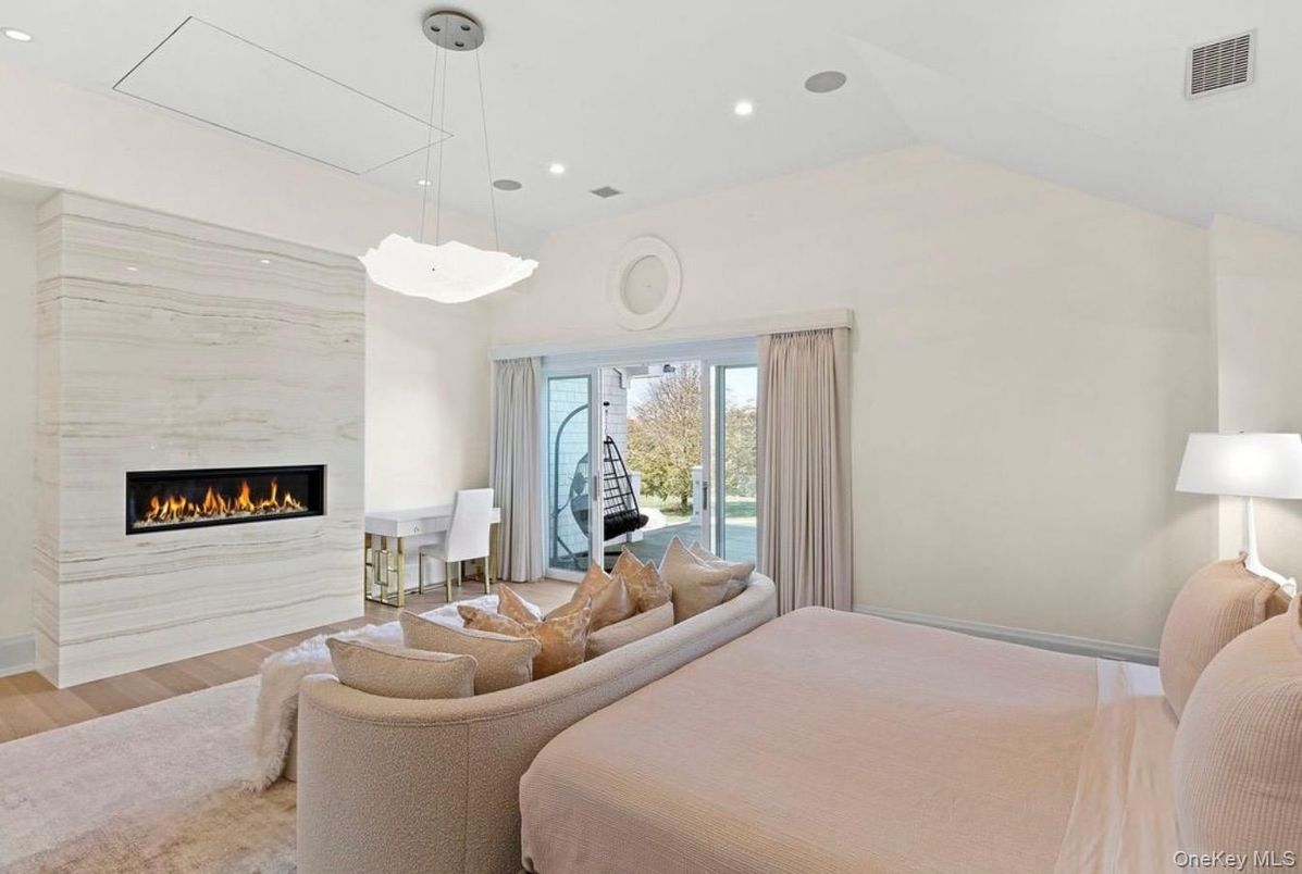 Bedroom, Fireplace, Interior, Pendant Lights, Recessed Lighting, Wood Texture Flooring