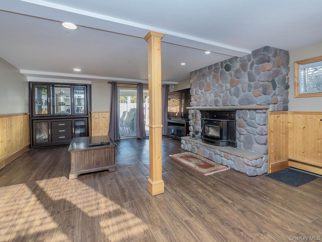 Fireplace, Interior, Recessed Lighting, Stone Walls, Wood Texture Flooring