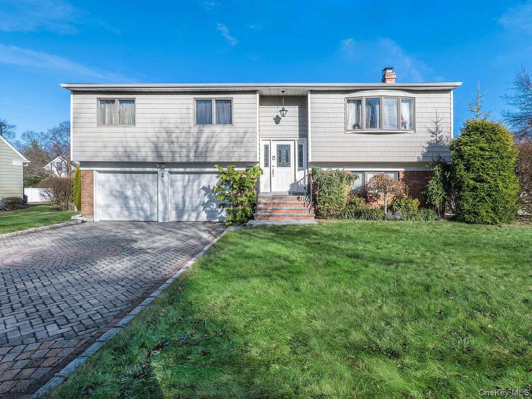 Attached, Exterior, Facade, Raised Ranch