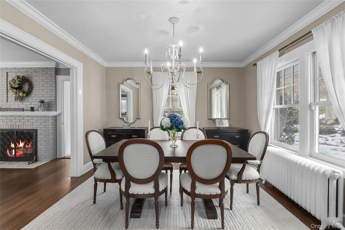 Chandelier, Dining room, Fireplace, Interior, Stone Walls, Wood Texture Flooring