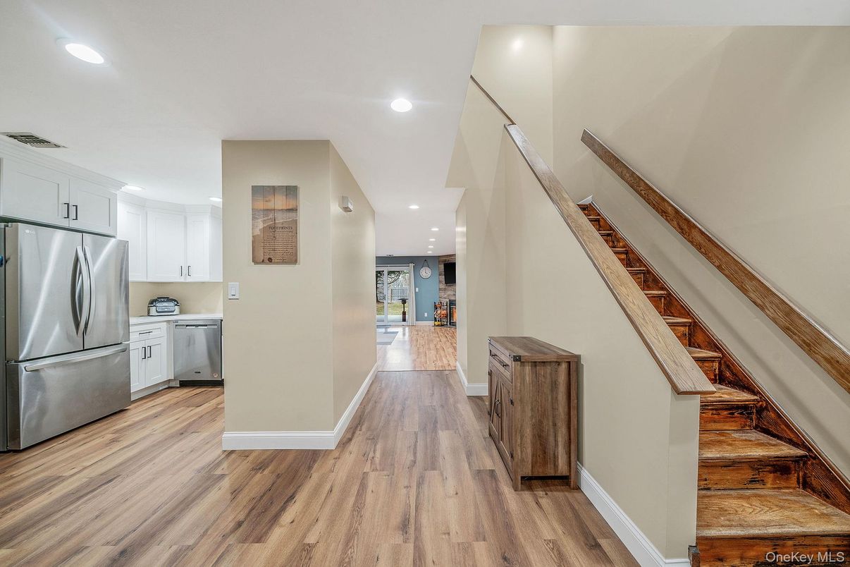 Interior, Kitchen, Recessed Lighting, Washer, Wood Texture Flooring