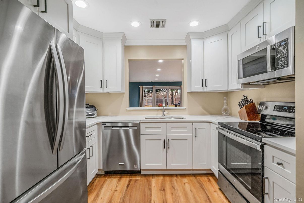 Interior, Kitchen, Recessed Lighting, Stainless Steel Appliances, Wood Texture Flooring