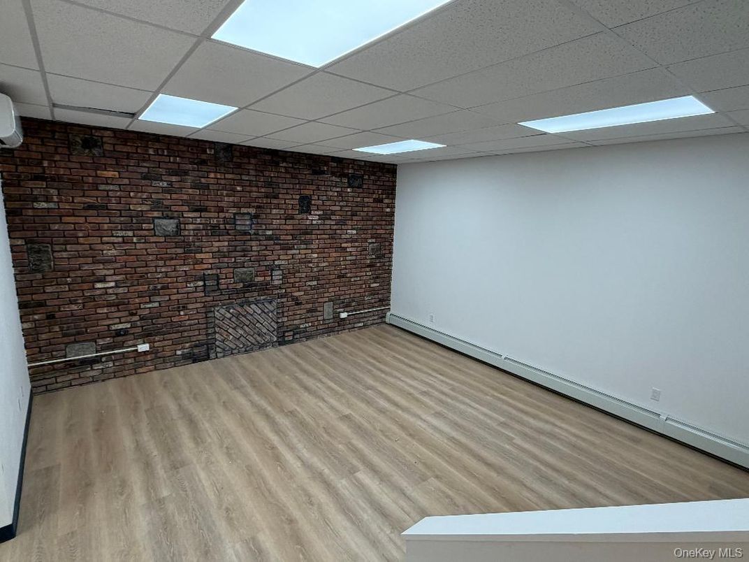 Empty room, Interior, Recessed Lighting, Stone Walls, Wood Texture Flooring