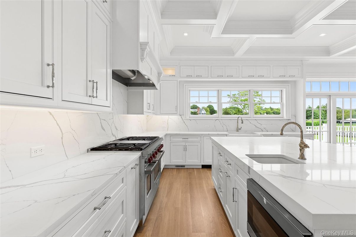 Interior, Kitchen, Marble Walls, Recessed Lighting, Stainless Steel Appliances, Wood Texture Flooring