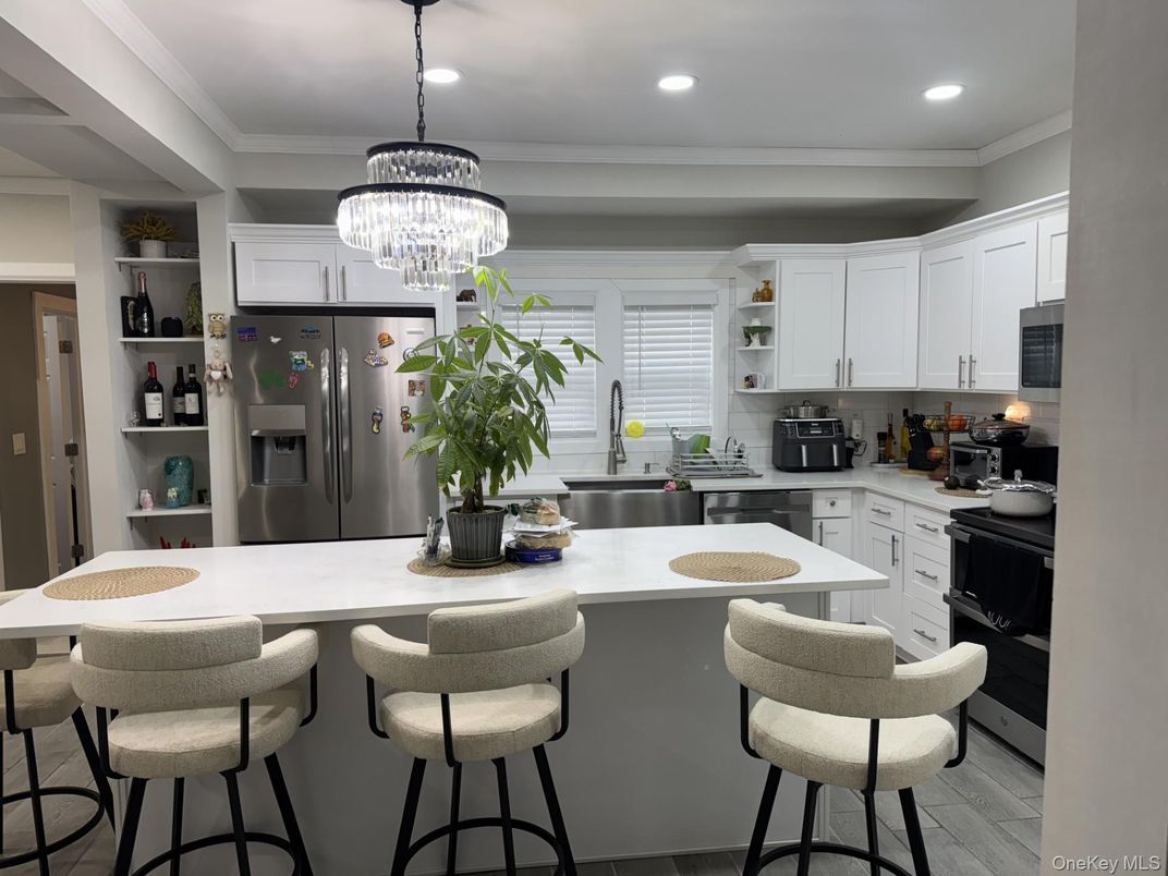 Chandelier, Interior, Kitchen, Recessed Lighting, Stainless Steel Appliances, Wood Texture Flooring