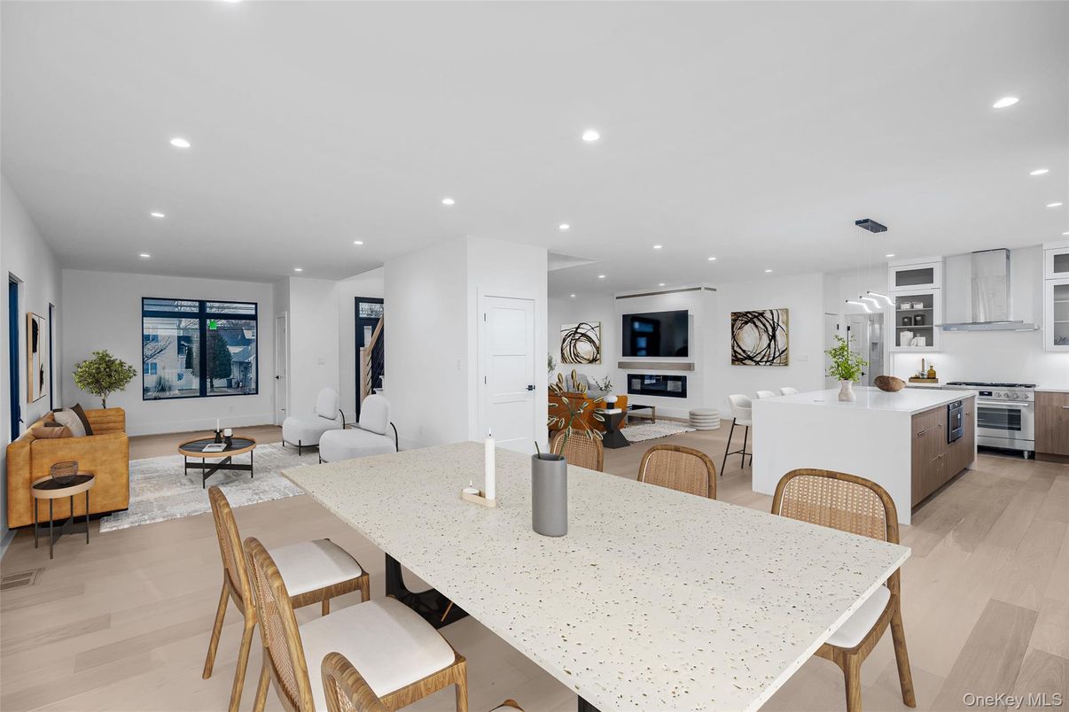 Dining room, Interior, Kitchen, Living room, Recessed Lighting, Stainless Steel Appliances, Wood Texture Flooring