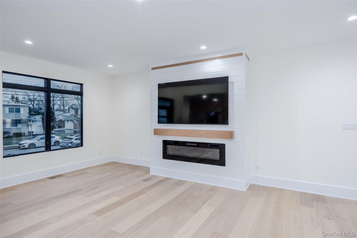 Empty room, Fireplace, Interior, Recessed Lighting, Wood Texture Flooring
