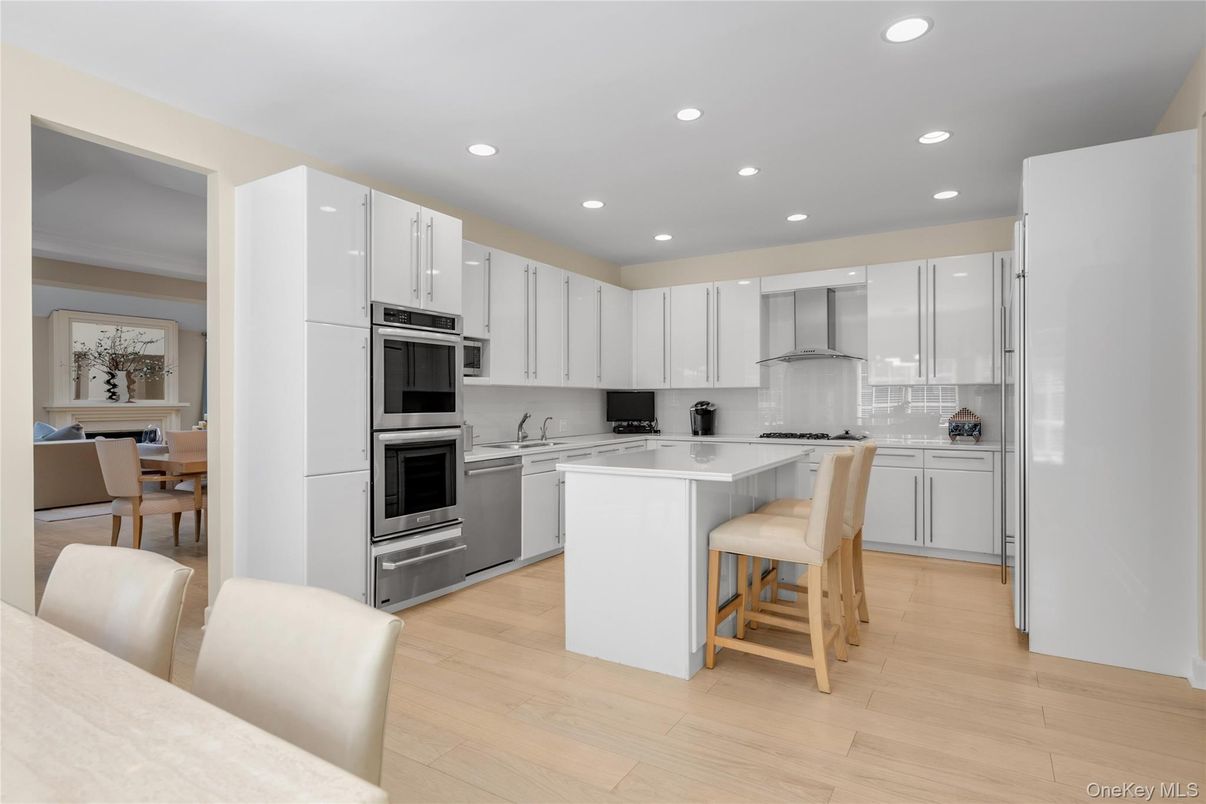 Dining room, Interior, Kitchen, Recessed Lighting, Stainless Steel Appliances, Wood Texture Flooring