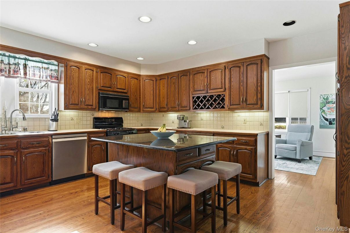 Interior, Kitchen, Recessed Lighting, Tile Countertops, Wood Texture Flooring