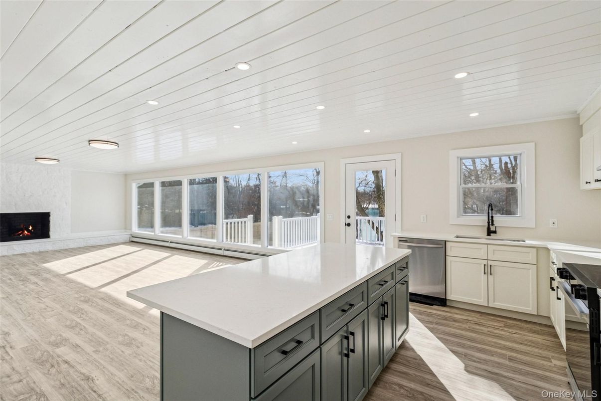 Fireplace, Interior, Kitchen, Recessed Lighting, Wood Texture Flooring