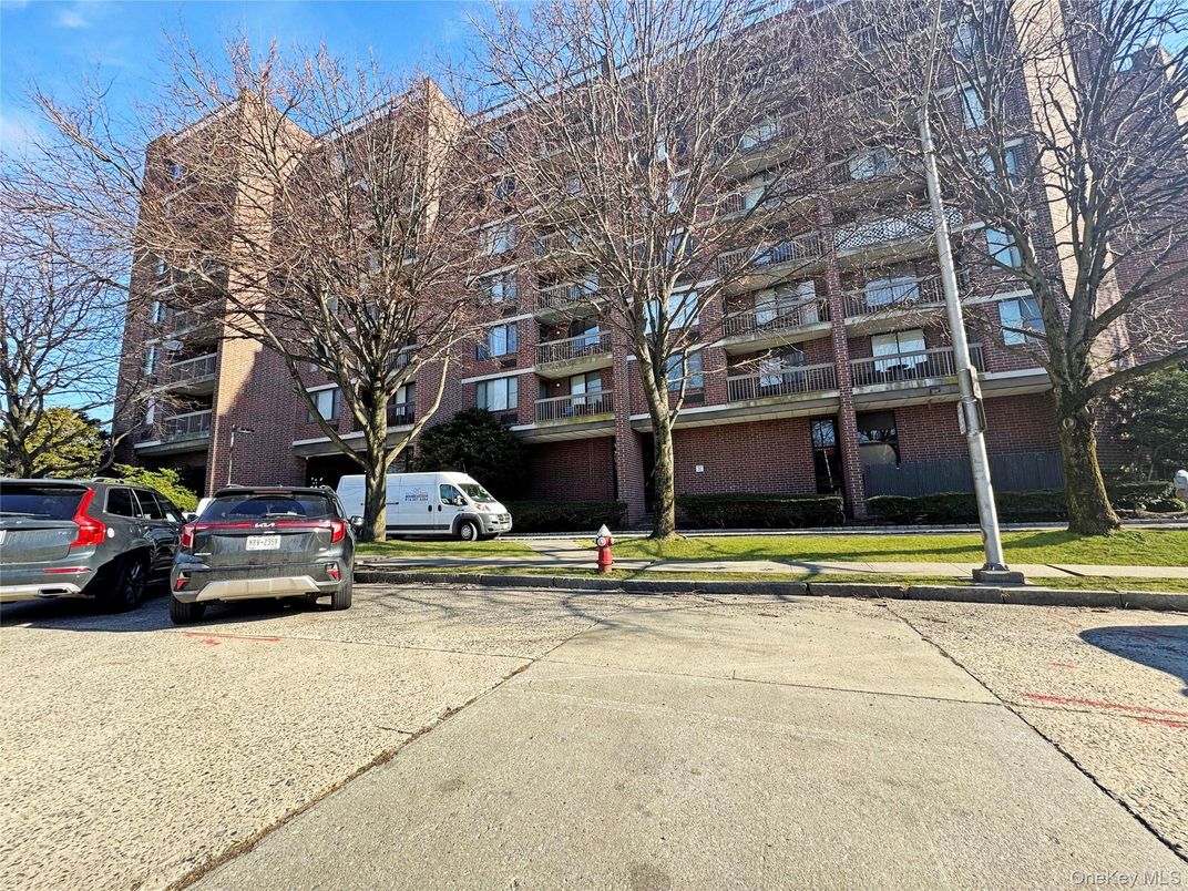 Exterior, Facade, Brick Facade, Condo Building