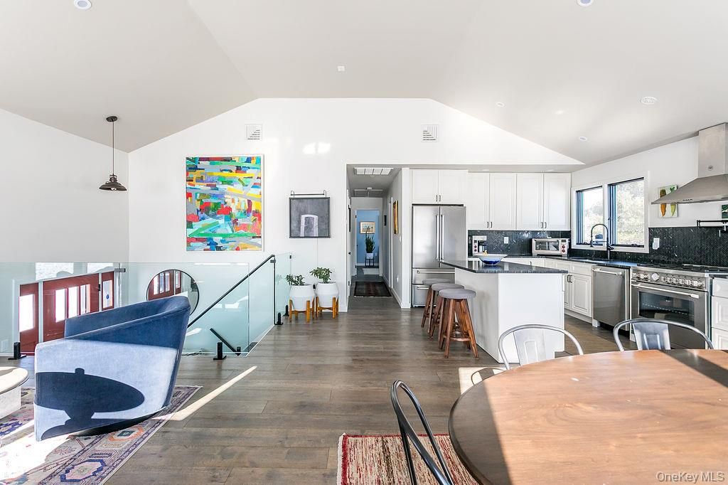 Dining room, Interior, Kitchen, Pendant Lights, Recessed Lighting, Stainless Steel Appliances, Wood Texture Flooring