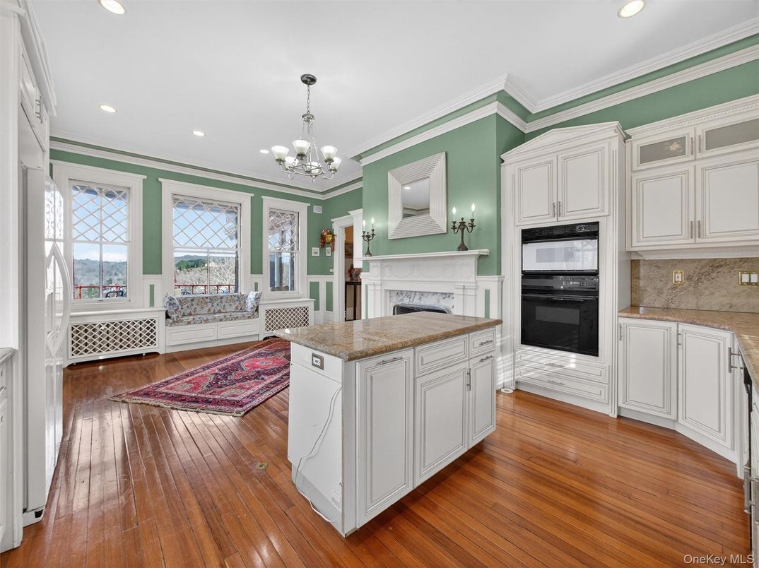 Chandelier, Fireplace, Interior, Kitchen, Recessed Lighting, Wood Texture Flooring