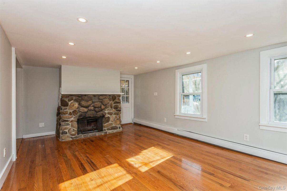Empty room, Fireplace, Interior, Recessed Lighting, Wood Texture Flooring